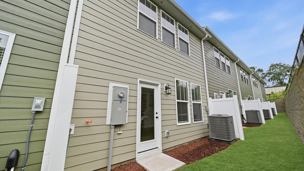 Exterior details and patio area of a home in Clayton Crossing, Arden (Image 3).