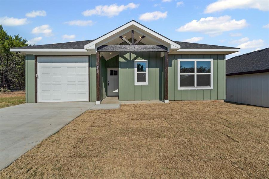 Front exterior of a new home in , Granbury, TX, highlighting curb appeal (Image 21).