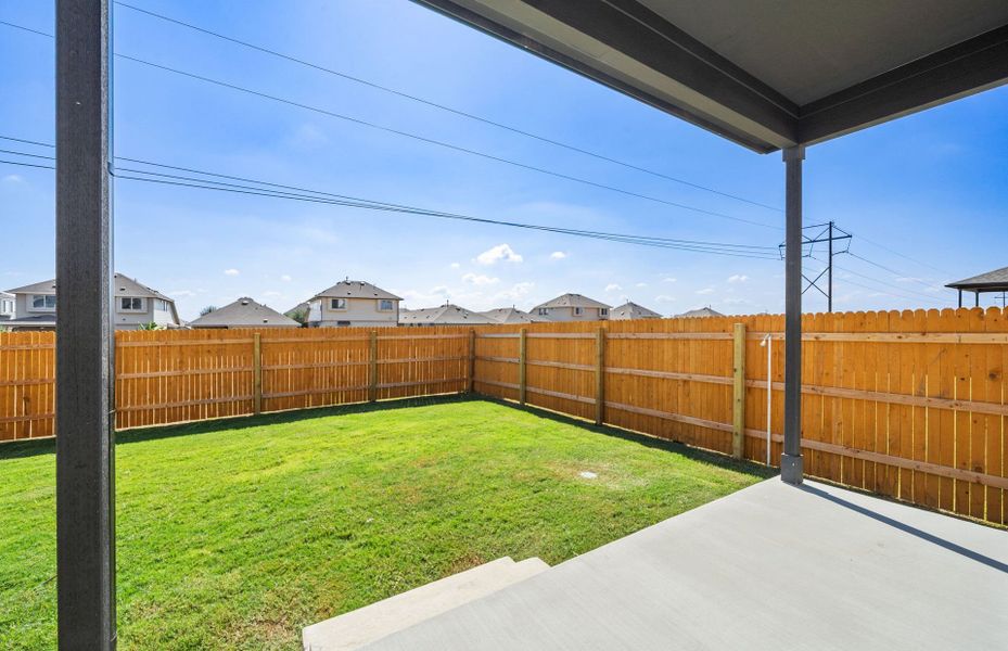 Exterior details and patio area of a home in Crosswinds, Kyle (Image 25).
