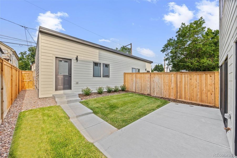 Front exterior of a new home in , Denver, CO, highlighting curb appeal (Image 23).
