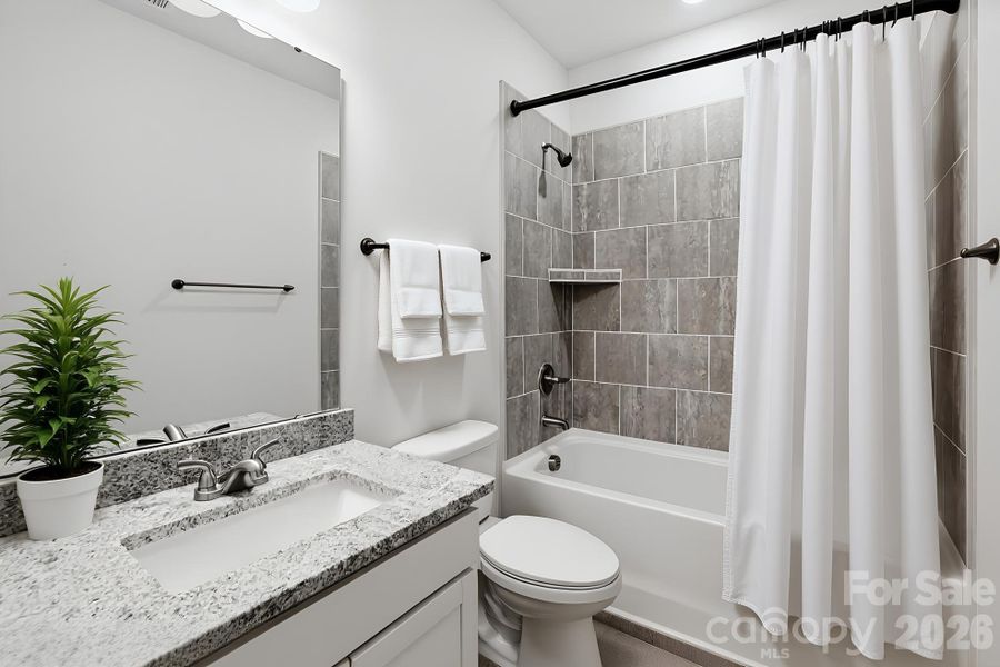 Furnished interior view inside a new home in Sloan Station, Charlotte (Image 15).