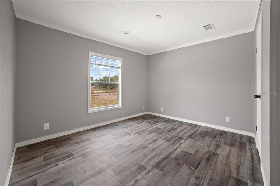 Spacious, unfurnished interior of a new home in , Okeechobee (Image 22).
