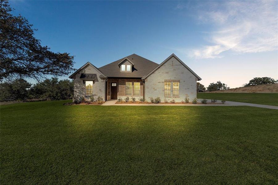Front exterior of a new home in Oak Grove Addition, Springtown, TX, highlighting curb appeal (Image 25).