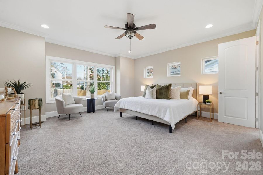 Primary suite with oversized window wall — beautifully bright and inviting. Primary suite with oversized window wall — beautifully bright and inviting.