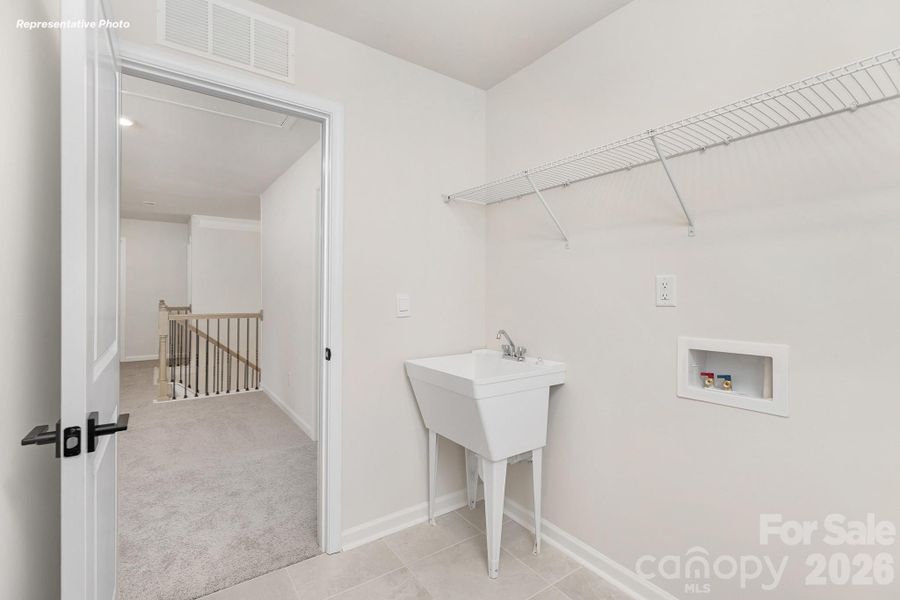 Furnished interior view inside a new home in Sylvan Creek, Denver (Image 25).