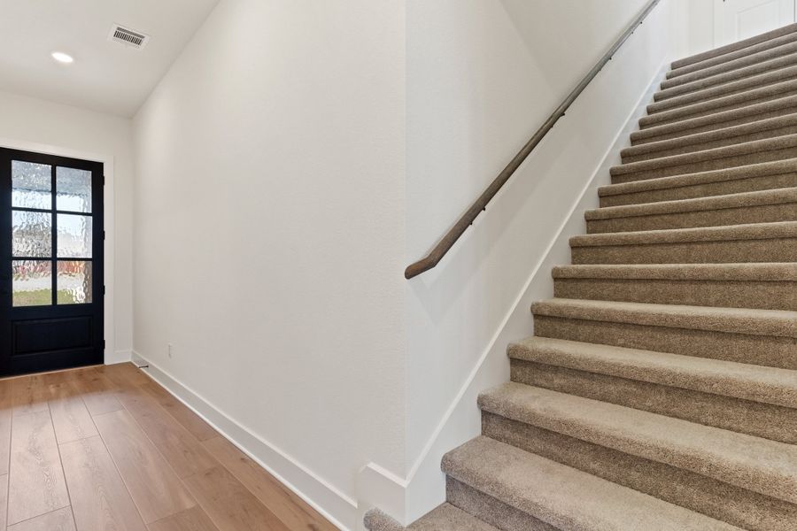 Representative unfurnished interior of a home built from the Waterville by Ashton Woods in The Trails at Carmel, Pflugerville (Image 24).