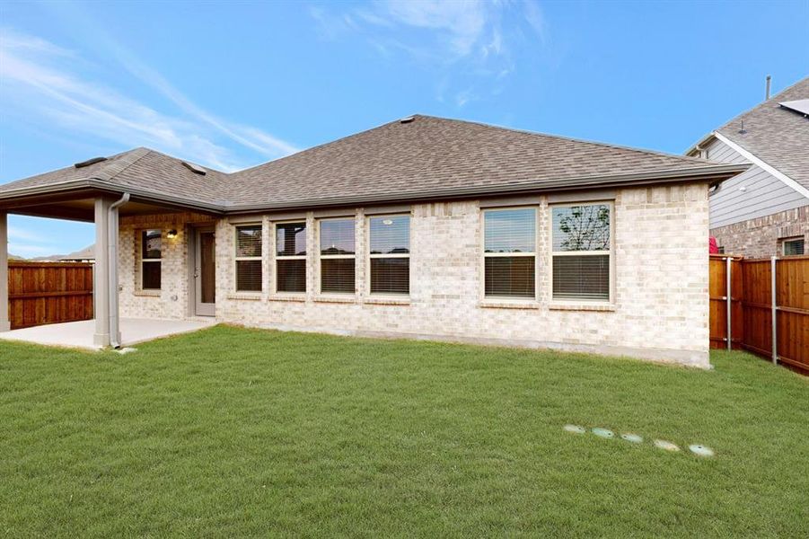 Exterior details and patio area of a home in The Preserve, Justin (Image 21). Exterior details and patio area of a home in The Preserve, Justin (Image 21).