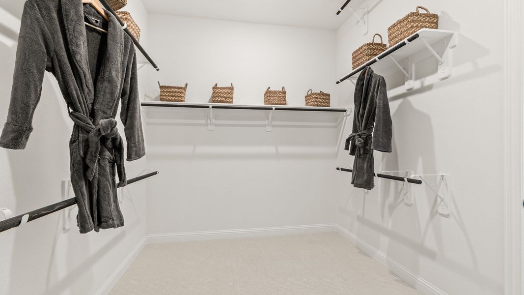 Representative furnished interior of a home built from the Rosewood by DRB Homes in Brookewater, Rosenberg (Image 18).