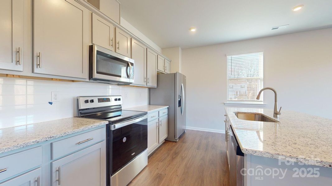 Furnished interior view inside a new home in , Charlotte (Image 5).