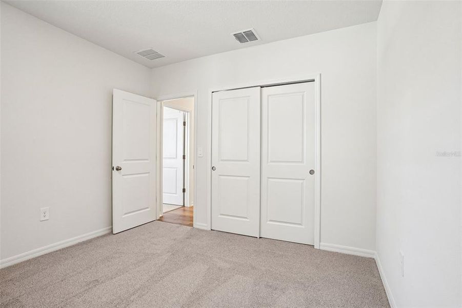 Spacious, unfurnished interior of a new home in Ridgehaven - Villas, Ormond Beach (Image 34).