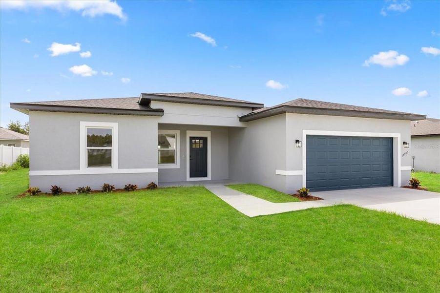 Front exterior of a new home in , Ocala, FL, highlighting curb appeal (Image 22). Front exterior of a new home in , Ocala, FL, highlighting curb appeal (Image 22).