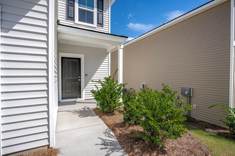 Exterior details and patio area of a home in Grand Arbor, Blythewood (Image 3).