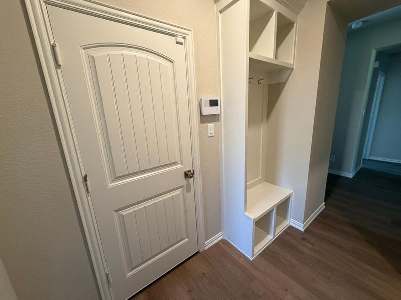 Built-in hall tree with storage cubbies and coat hooks