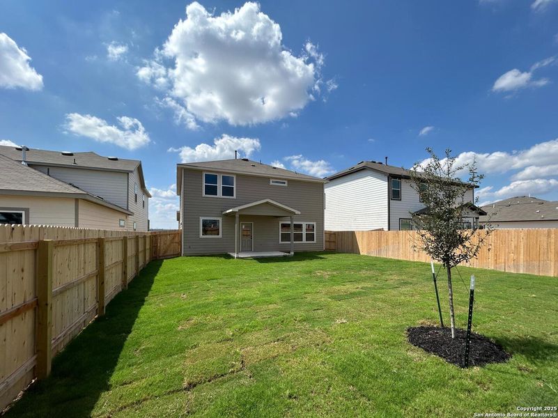 Front exterior of a new home in Enclave at Hennersby Hollow 50's, San Antonio, TX, highlighting curb appeal (Image 21). Front exterior of a new home in Enclave at Hennersby Hollow 50's, San Antonio, TX, highlighting curb appeal (Image 21).