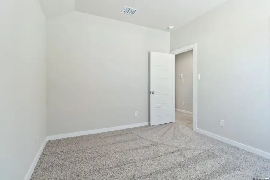 Spacious, unfurnished interior of a new home in Hunters Ranch, San Antonio (Image 15).