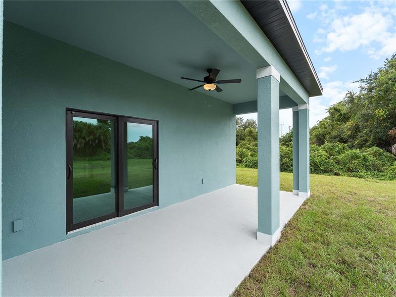 Exterior details and patio area of a home in , North Port (Image 24).
