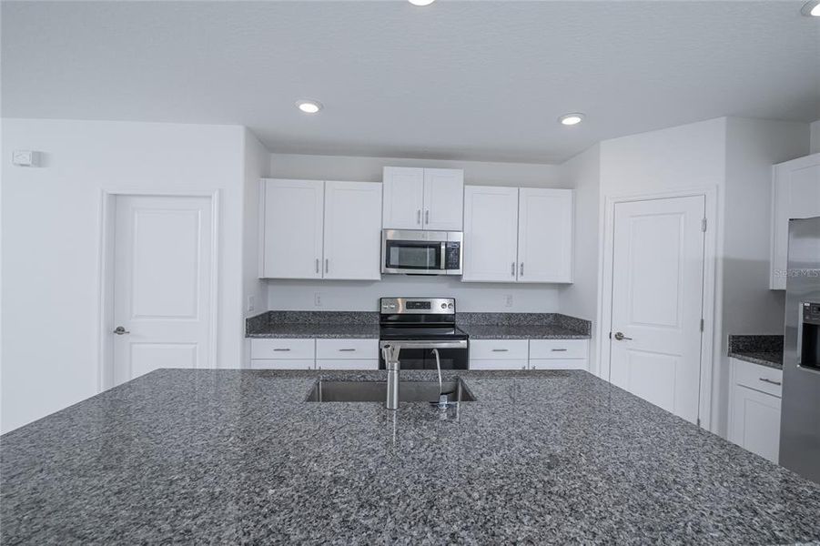 Furnished interior view inside a new home in Saddle Creek Preserve: The Manors II, Lakeland (Image 38).