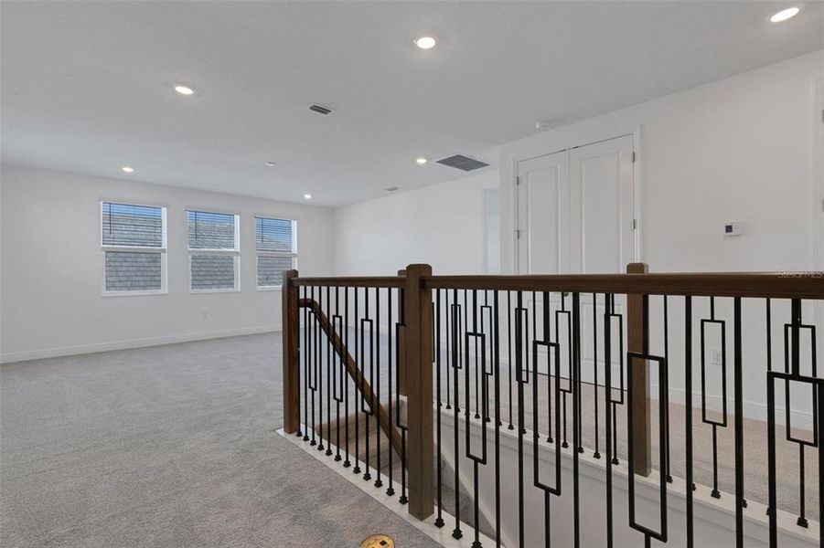 Spacious, unfurnished interior of a new home in Hawkstone, Sarasota (Image 63).
