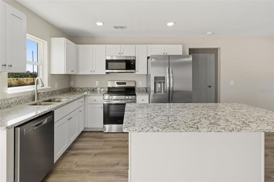 Furnished interior view inside a new home in , Avon Park (Image 5).