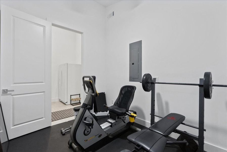 Skip the commute. Currently being used as private home gym, this is one of several versatile flex spaces!