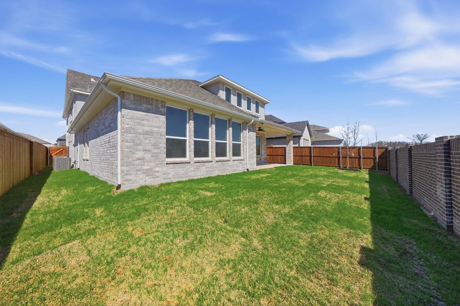 Exterior details and patio area of a home in Aster Park, McKinney (Image 4).