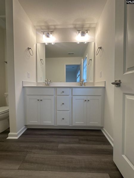 Furnished interior view inside a new home in Piney Woods Bluff, Columbia (Image 7). Furnished interior view inside a new home in Piney Woods Bluff, Columbia (Image 7).