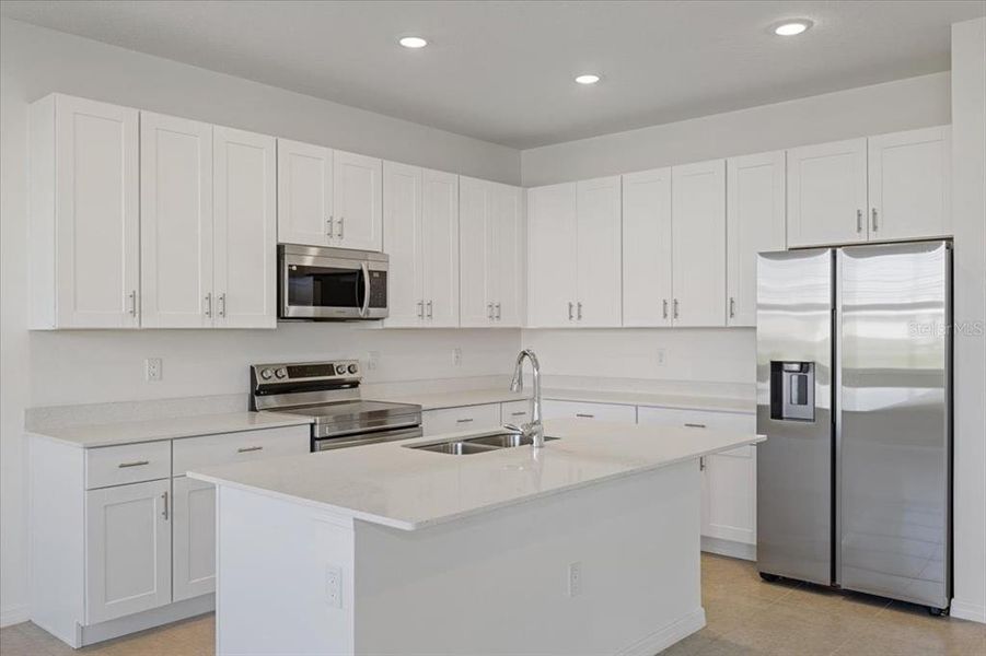 Furnished interior view inside a new home in Cypress Park Estates, Haines City (Image 3).
