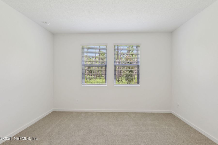 Spacious, unfurnished interior of a new home in Colbert Landings, Palm Coast (Image 10).