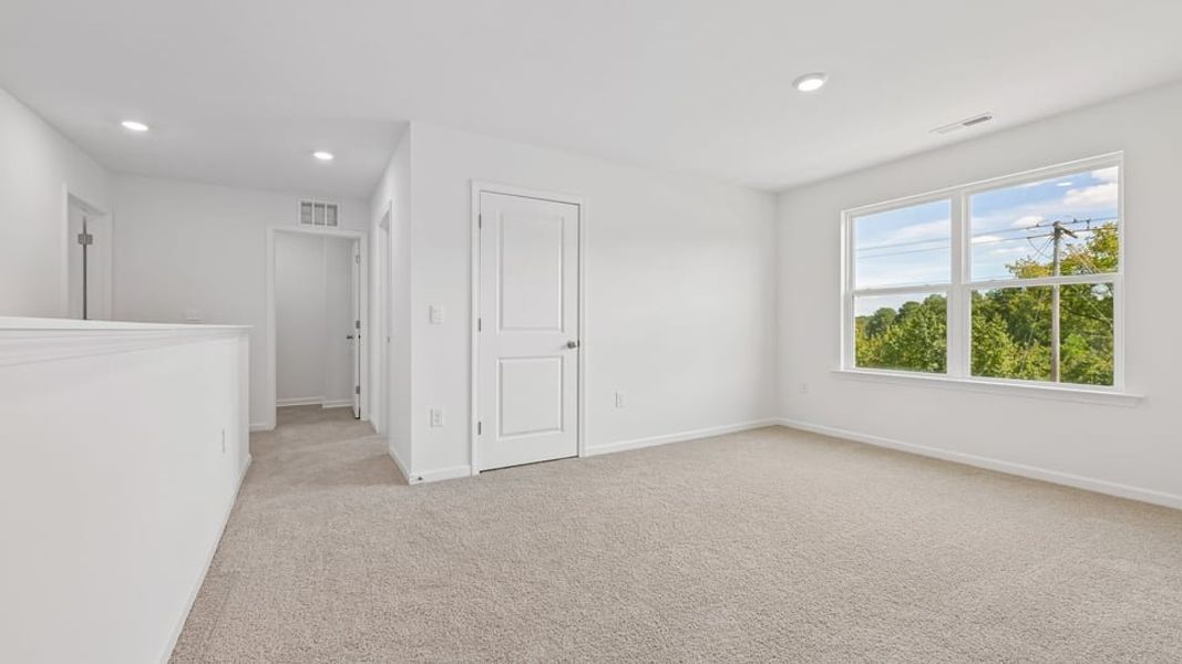 Spacious, unfurnished interior of a new home in Mason Ridge, Spring Lake (Image 22).