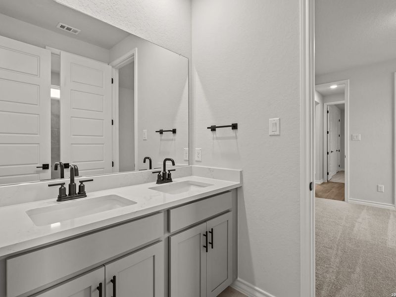 Furnished interior view inside a new home in Potranco Oaks, Castroville (Image 16).