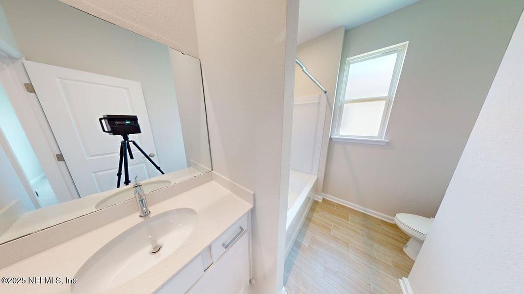 Furnished interior view inside a new home in Lakes at Bella Lago, Green Cove Springs (Image 7).