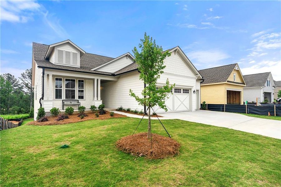 Front exterior of a new home in Cresswind Georgia at Twin Lakes, Hoschton, GA, highlighting curb appeal (Image 15).