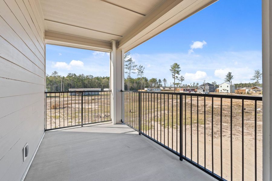 Exterior details and patio area of a home in , Conroe (Image 4).