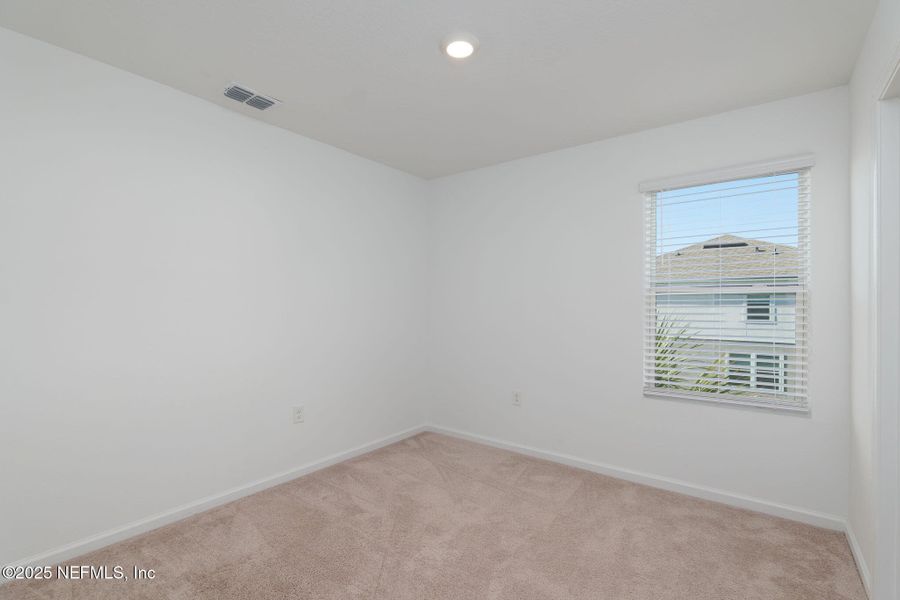 Spacious, unfurnished interior of a new home in Equinox East, Jacksonville (Image 19).
