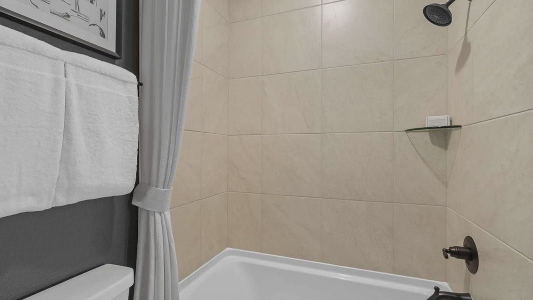 Representative interior finishes for a home built from the Acadia by Chesmar Homes in Elyson 50's, Katy (Image 20).