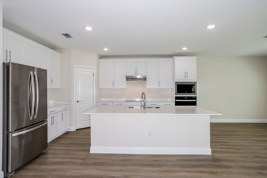 Furnished interior view inside a new home in Pasadena Landing, Wesley Chapel (Image 7).