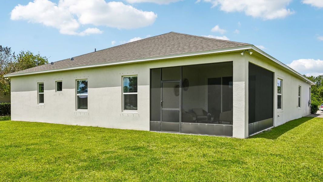 Exterior details and patio area of a home in Vero Lake Estates, Vero Beach (Image 4).