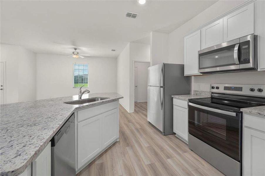 Furnished interior view inside a new home in Poinciana, Poinciana (Image 3).