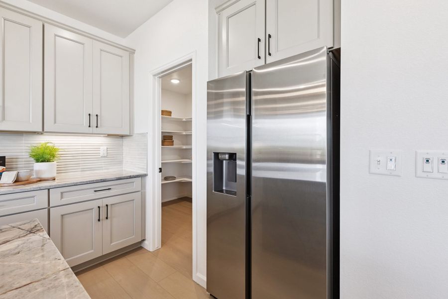 Representative furnished interior of a home built from the Jansen by Landsea Homes in Cherry Meadows, Brighton (Image 34).