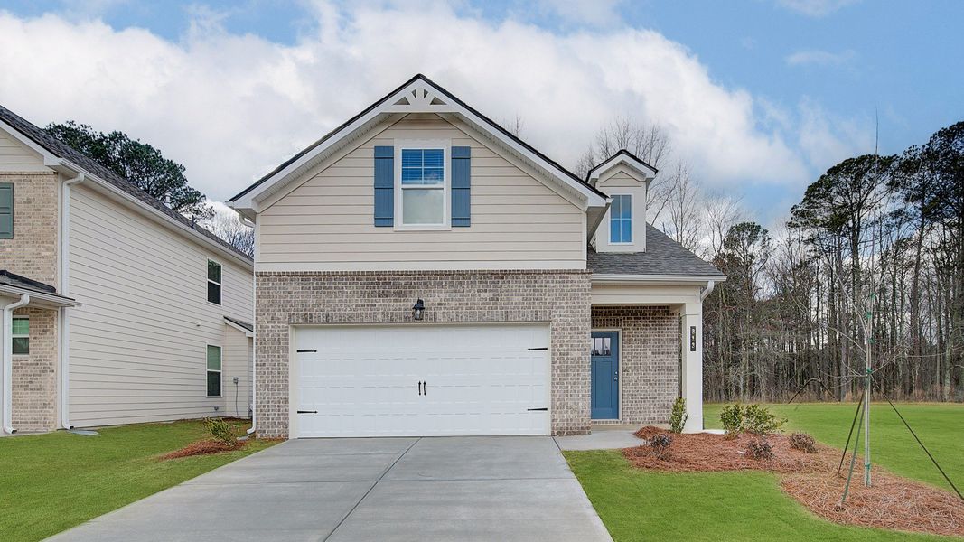 Representative exterior photo of a completed home built from the Emma by DRB Homes in Abbotts Crossing, Conyers, GA (Image 23).