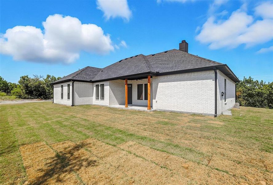 Front exterior of a new home in , Weatherford, TX, highlighting curb appeal (Image 28). Front exterior of a new home in , Weatherford, TX, highlighting curb appeal (Image 28).