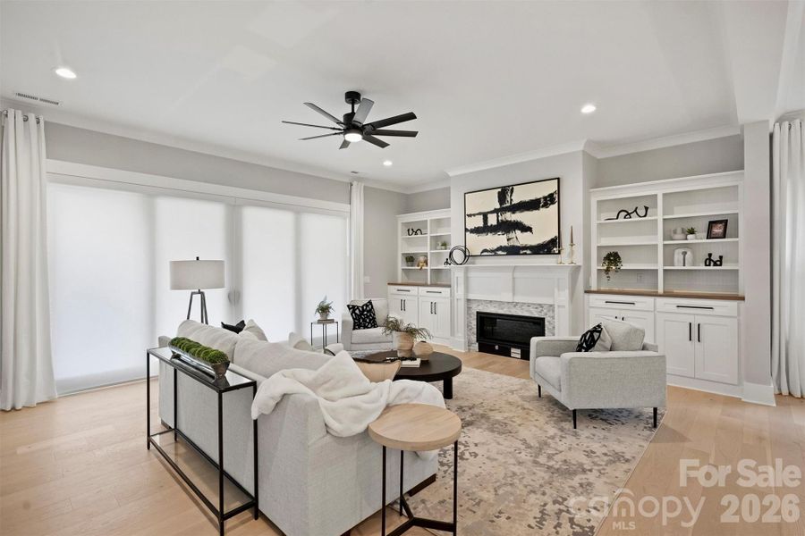 Custom remote shade on sliding doors for privacy.