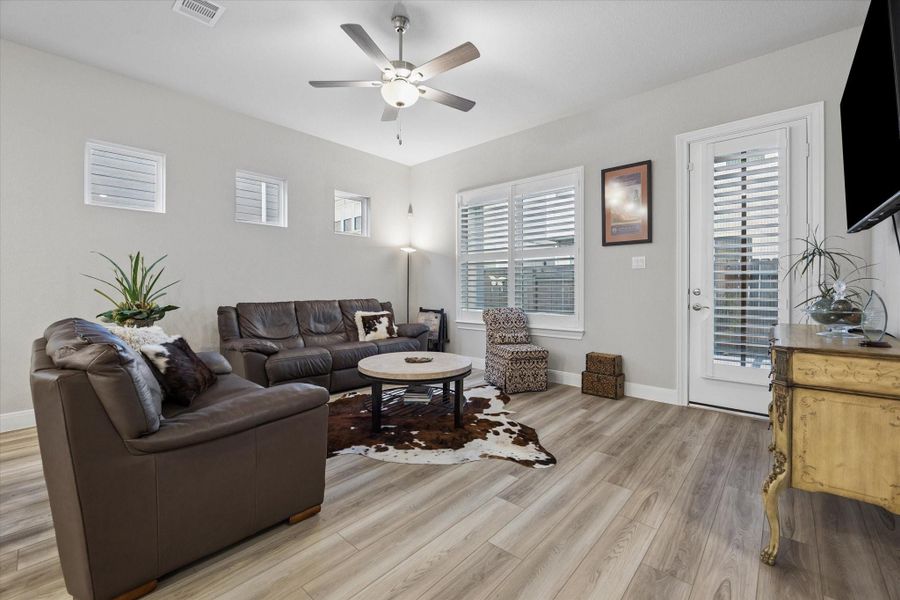 Furnished interior view inside a new home in Spring Brook Village - Luxe Series, Houston (Image 8).