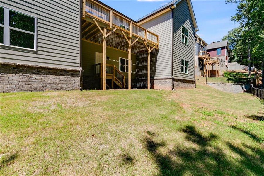 Front exterior of a new home in , Lithia Springs, GA, highlighting curb appeal (Image 16).