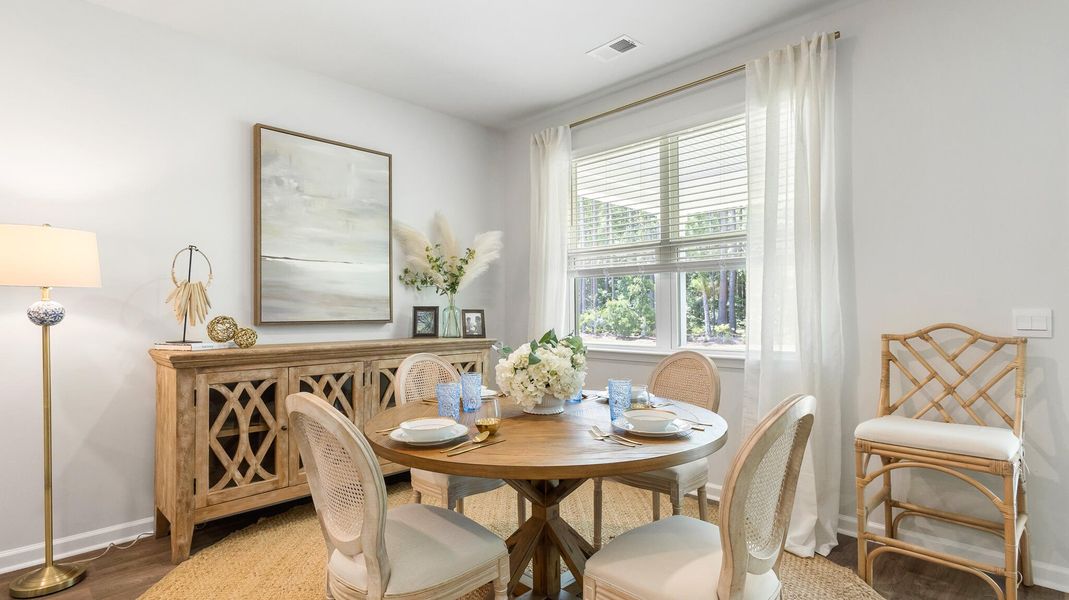 Furnished interior view inside a new home in Pine Hills at Cane Bay, Summerville (Image 11).