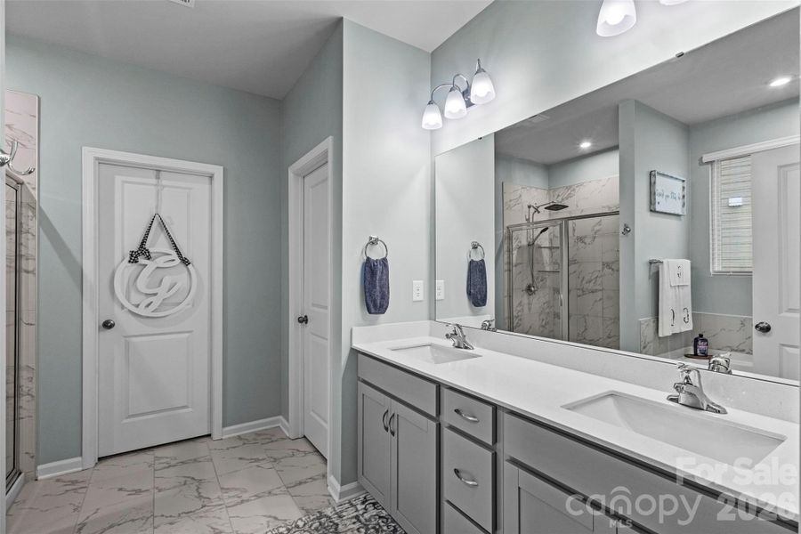 Dual vanities with an abundance of light. Dual vanities with an abundance of light.