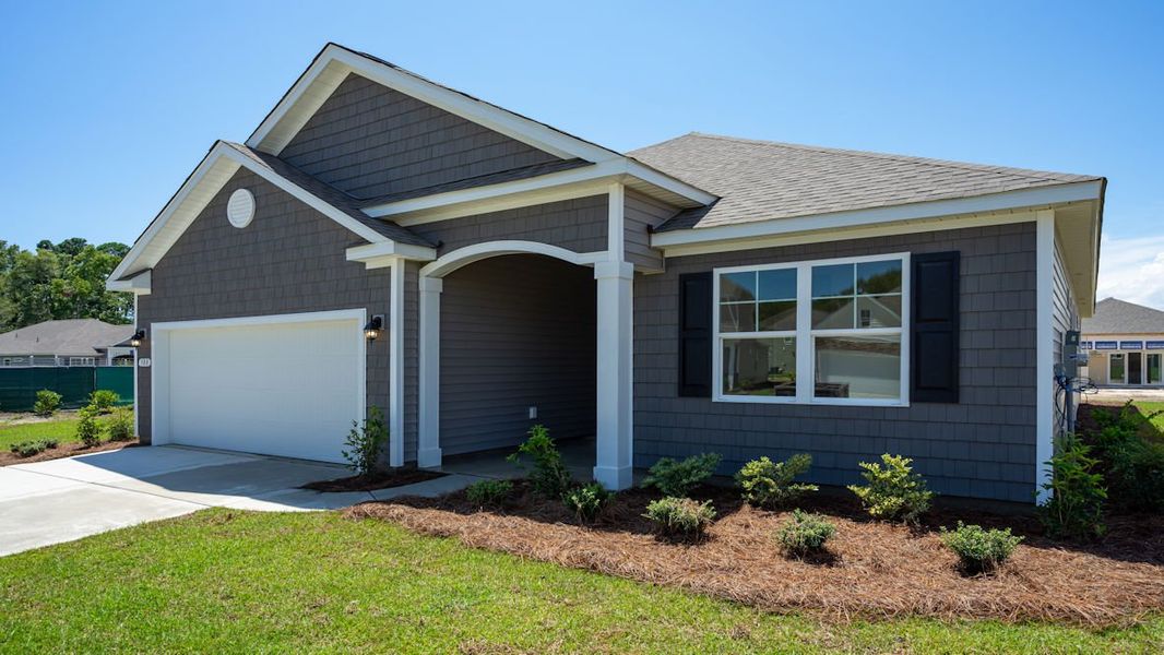 Representative exterior photo of a completed home built from the EATON by D.R. Horton in Waterbridge, Myrtle Beach, SC (Image 23).