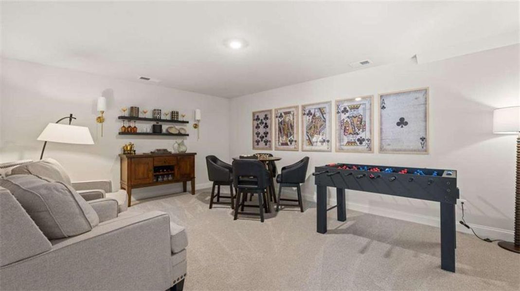 Furnished interior view inside a new home in Oak Ridge Meadows - Active Adult, Locust Grove (Image 11).