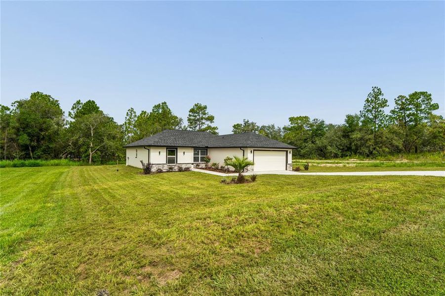 Exterior details and patio area of a home in , Brooksville (Image 29).