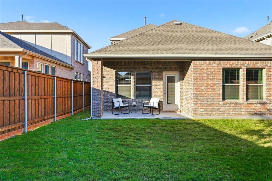 Exterior details and patio area of a home in Spiritas Ranch, Little Elm (Image 21). Exterior details and patio area of a home in Spiritas Ranch, Little Elm (Image 21).